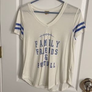 White family friends and football T-shirt